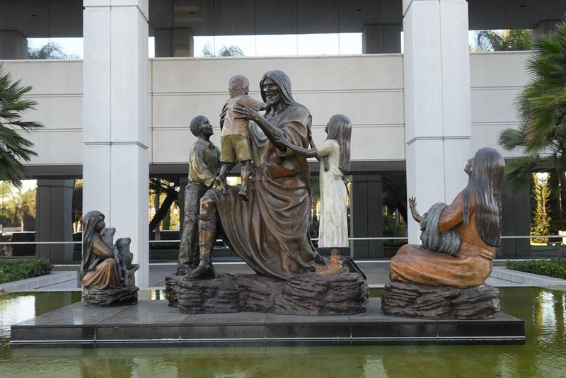 Jesus with children statue