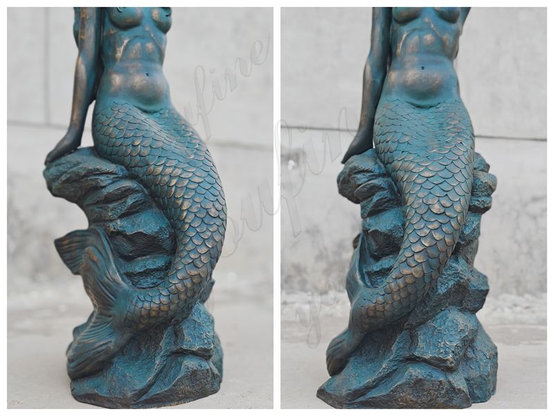 details of bronze mermaid statue tail