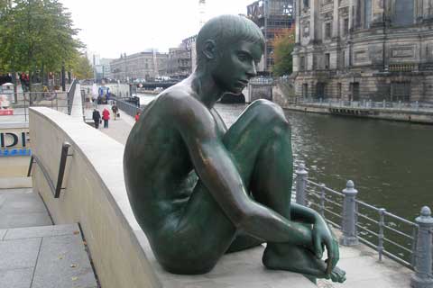 Bronze life size outdoor Sculpture Quiet Boy Near the River